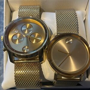 Two gold bold Movado watches
